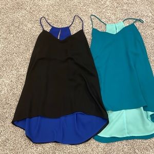 Lot of two reversible Express tanks Size Medium
